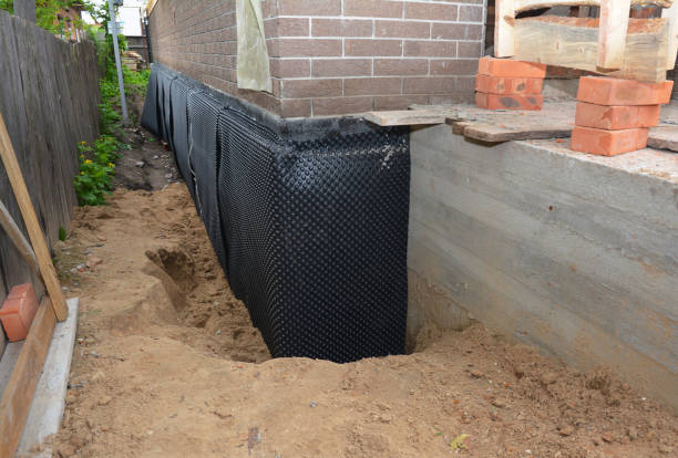 SJ Waterproofing Pros technician performing targeted Vapor Barrier Installation assessment in Marengo, OH